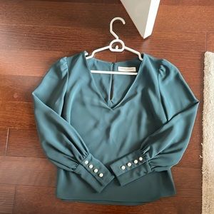 Amanda Uprichard Green blouse with pearl button sleeves